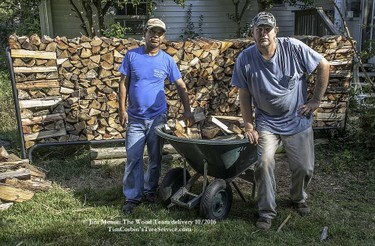 Employees deliver & stack firewood: timcorbinstreeservice.com